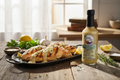 Grilled chicken with sauce bottle